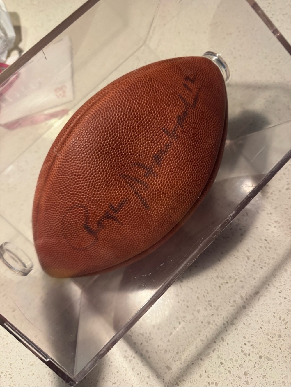 Roger Staubach #12 Football in Damaged Display Case – Vintage NFL Collectible